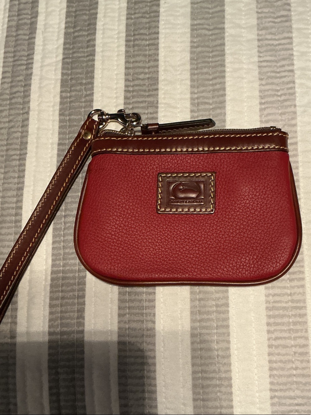 Dooney & Bourke Red Leather Wristlet with Brown Trim